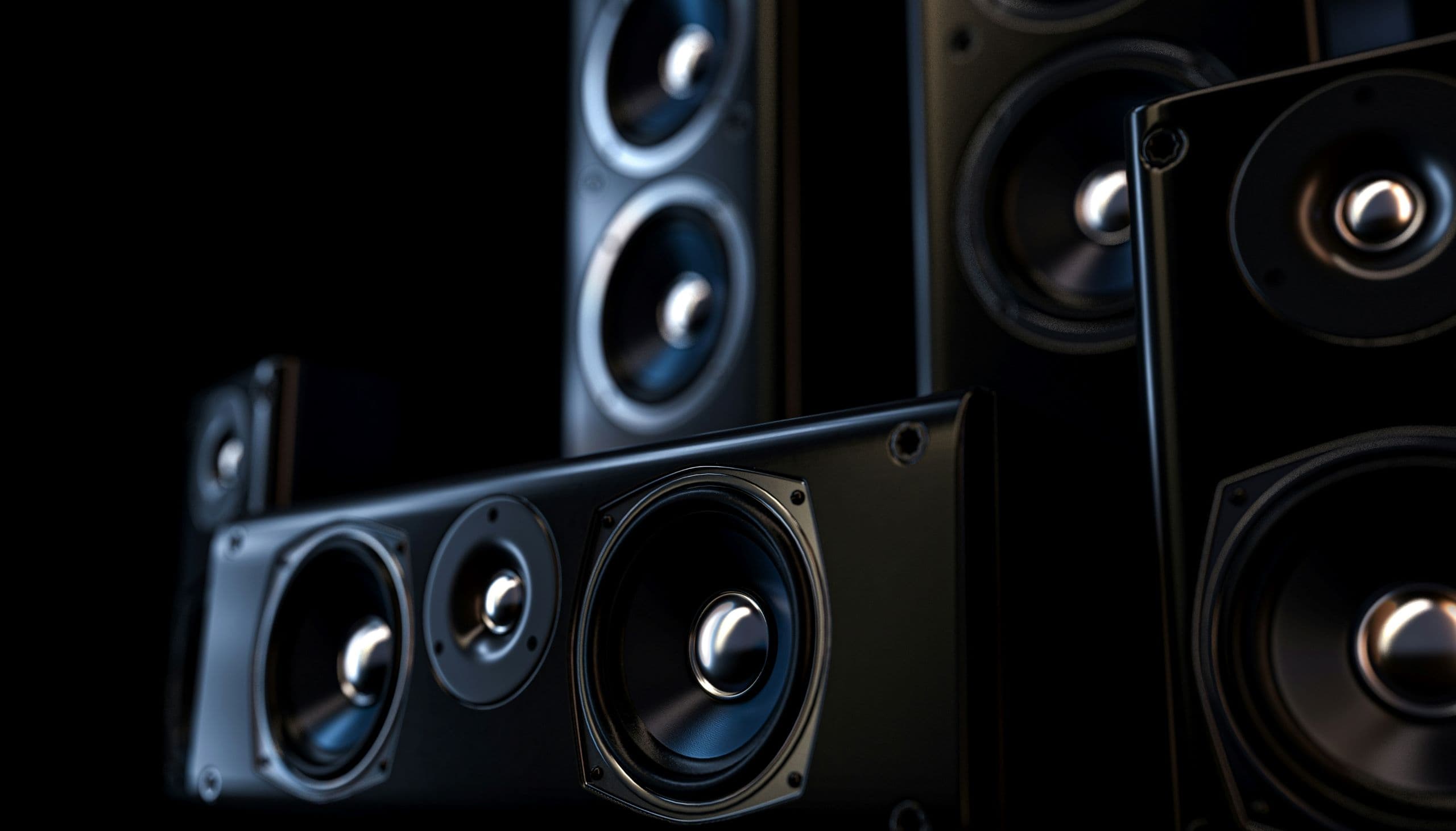 A group of speakers sitting next to each other