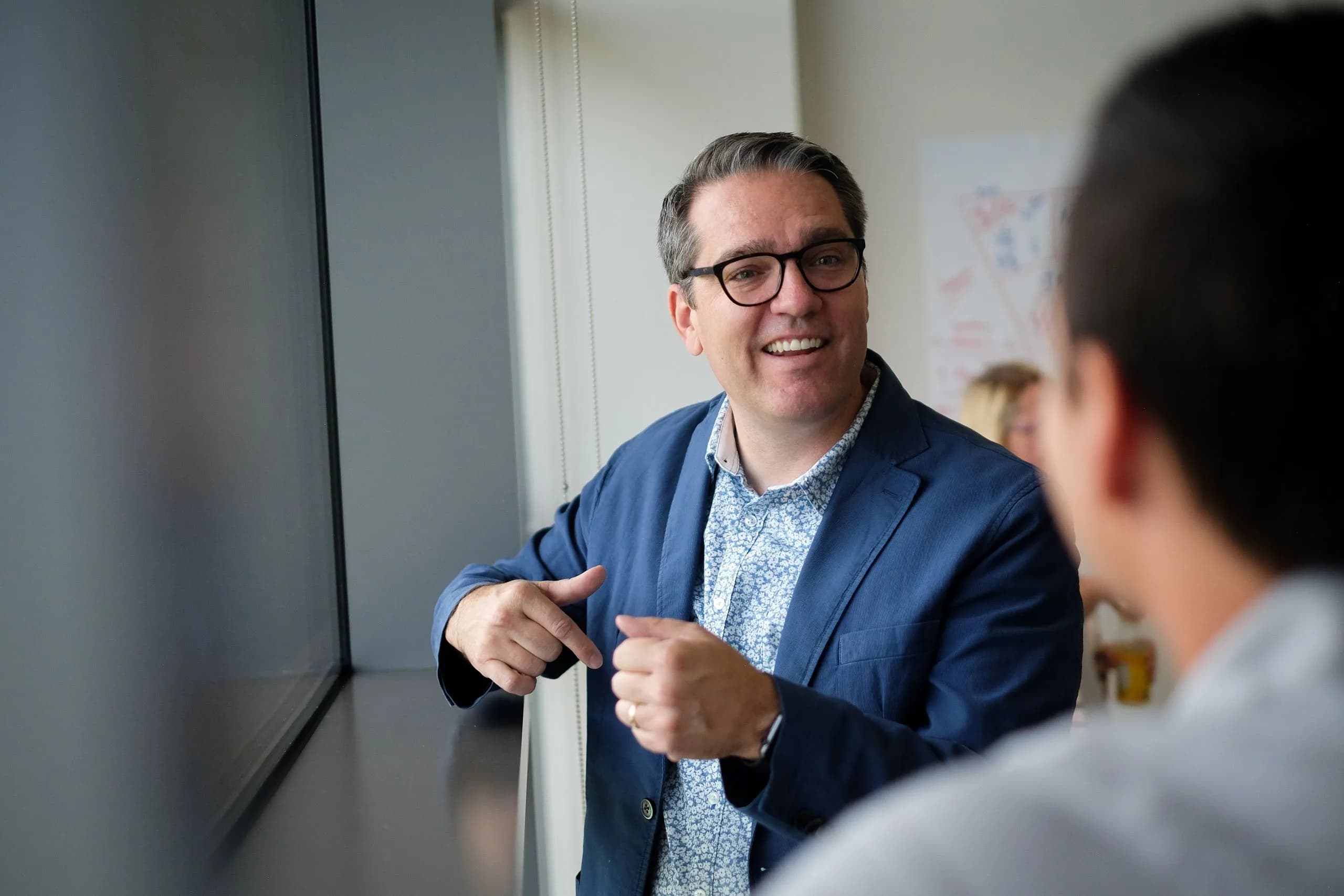Richard Fagerlin coaching a leader one-on-one